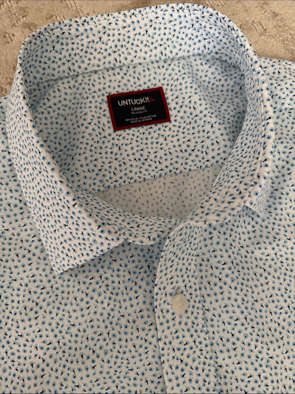 Untuckit Large relaxed fit performance button down